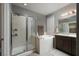 Bathroom with walk-in shower and soaking tub at 7620 Chase Hallow St, Las Vegas, NV 89149