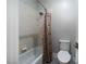 Clean bathroom with shower/tub combo and updated fixtures at 7620 Chase Hallow St, Las Vegas, NV 89149