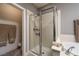 Bathroom with shower stall and access to a toilet area at 7620 Chase Hallow St, Las Vegas, NV 89149