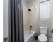 Small bathroom with shower/tub combo and toilet at 7620 Chase Hallow St, Las Vegas, NV 89149