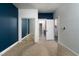 Bedroom with mirrored closet and access to bathroom at 7620 Chase Hallow St, Las Vegas, NV 89149