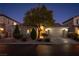 House exterior at night with landscaping and driveway at 7620 Chase Hallow St, Las Vegas, NV 89149