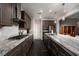Spacious kitchen with granite countertops and stainless steel appliances at 7620 Chase Hallow St, Las Vegas, NV 89149