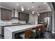 Modern kitchen with stainless steel appliances and granite countertops at 7620 Chase Hallow St, Las Vegas, NV 89149
