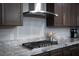 Modern kitchen with stainless steel appliances and granite countertops at 7620 Chase Hallow St, Las Vegas, NV 89149