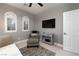 Relaxing sitting area with comfy seating and a flat-screen TV at 7620 Chase Hallow St, Las Vegas, NV 89149