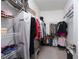 Large walk-in closet with ample shelving and hanging space at 7620 Chase Hallow St, Las Vegas, NV 89149