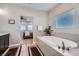 Luxurious bathroom with a large soaking tub and double vanity at 8068 Buena Vida St, Las Vegas, NV 89166