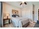 Cozy bedroom with a queen bed and gray bedding at 8068 Buena Vida St, Las Vegas, NV 89166