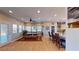 Bright dining area with wood floors and a view to the kitchen at 8068 Buena Vida St, Las Vegas, NV 89166