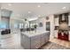 Spacious kitchen with a large island and red range at 8068 Buena Vida St, Las Vegas, NV 89166