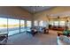 Spacious living room with lots of natural light and access to patio at 8068 Buena Vida St, Las Vegas, NV 89166