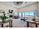 Spacious living room with a fireplace and large sliding glass doors at 8068 Buena Vida St, Las Vegas, NV 89166