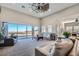 Open living area with large windows and comfortable seating at 8068 Buena Vida St, Las Vegas, NV 89166