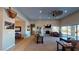 Open concept living room with hardwood floors and high ceilings at 8068 Buena Vida St, Las Vegas, NV 89166