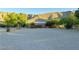 View of a small outbuilding and desert landscape at 8068 Buena Vida St, Las Vegas, NV 89166