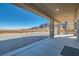 Covered patio with mountain views and a spiral staircase at 8068 Buena Vida St, Las Vegas, NV 89166