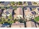 Aerial view of house and neighborhood, showcasing solar panels at 8212 Opal Falls St, North Las Vegas, NV 89085