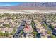 House with solar panels, aerial view of community at 8212 Opal Falls St, North Las Vegas, NV 89085