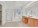 Bathroom with double vanity, shower, and bathtub at 8212 Opal Falls St, North Las Vegas, NV 89085