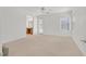 Spacious bedroom with carpet flooring and access to a private bathroom at 8212 Opal Falls St, North Las Vegas, NV 89085