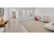 Living room with two armchairs and a white couch at 8212 Opal Falls St, North Las Vegas, NV 89085