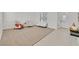 Living room with entryway, tiled floor and carpet at 8212 Opal Falls St, North Las Vegas, NV 89085