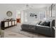 Virtually staged main bedroom with a large bed and ensuite bathroom at 8212 Opal Falls St, North Las Vegas, NV 89085