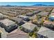 Aerial view of community pool and surrounding homes at 8486 Insignia Ave # 101, Las Vegas, NV 89178