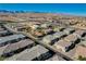Aerial view of community with pool and surrounding homes at 8486 Insignia Ave # 101, Las Vegas, NV 89178