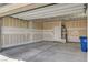 Unfinished garage with open space and overhead door at 8486 Insignia Ave # 101, Las Vegas, NV 89178