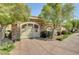Gated entrance to the community pool area with stonework at 8486 Insignia Ave # 101, Las Vegas, NV 89178