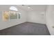 Bright main bedroom with arched window and ceiling fan at 8560 Lost Gold Ave, Las Vegas, NV 89129