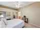 Spacious bedroom with large bed, mirrored closet, and ensuite access at 8985 S Durango Dr # 1113, Las Vegas, NV 89113