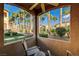 Private patio with seating and lush landscaping views at 8985 S Durango Dr # 1113, Las Vegas, NV 89113