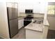 Modern kitchen with stainless steel appliances and granite countertops at 9050 W Warm Springs Rd # 2049, Las Vegas, NV 89148