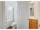 Bathroom with shower/tub combo and wood vanity at 10079 S Riley St, Las Vegas, NV 89178