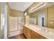 Double vanity bathroom with shower and tub at 10079 S Riley St, Las Vegas, NV 89178