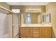 Bathroom with double vanity and shower/tub combo at 10079 S Riley St, Las Vegas, NV 89178