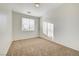 Well-lit bedroom with window and carpet flooring at 10079 S Riley St, Las Vegas, NV 89178