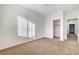 Spacious bedroom with carpet flooring and mirrored closet doors at 10079 S Riley St, Las Vegas, NV 89178