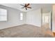 Large bedroom with ceiling fan and ample closet space at 10079 S Riley St, Las Vegas, NV 89178