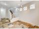 Open dining area showcasing tile floors and staircase at 10079 S Riley St, Las Vegas, NV 89178