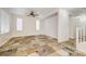 Living room with tile flooring and a ceiling fan at 10079 S Riley St, Las Vegas, NV 89178