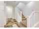 Carpeted staircase leading to upper level at 10079 S Riley St, Las Vegas, NV 89178