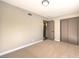 Spacious bedroom with carpet floors and an adjacent bathroom at 104 Temple Dr, Las Vegas, NV 89107