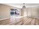 Living area with hardwood floors and sliding doors to backyard at 104 Temple Dr, Las Vegas, NV 89107