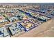 Aerial view of a luxury home with pool and solar panels, located in a modern community at 11903 Sandstone Arch Dr, Las Vegas, NV 89138