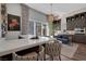 Modern bar area with seating and built-in shelving at 11903 Sandstone Arch Dr, Las Vegas, NV 89138