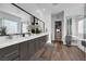 Modern bathroom with double vanity, walk-in shower, and soaking tub at 11903 Sandstone Arch Dr, Las Vegas, NV 89138